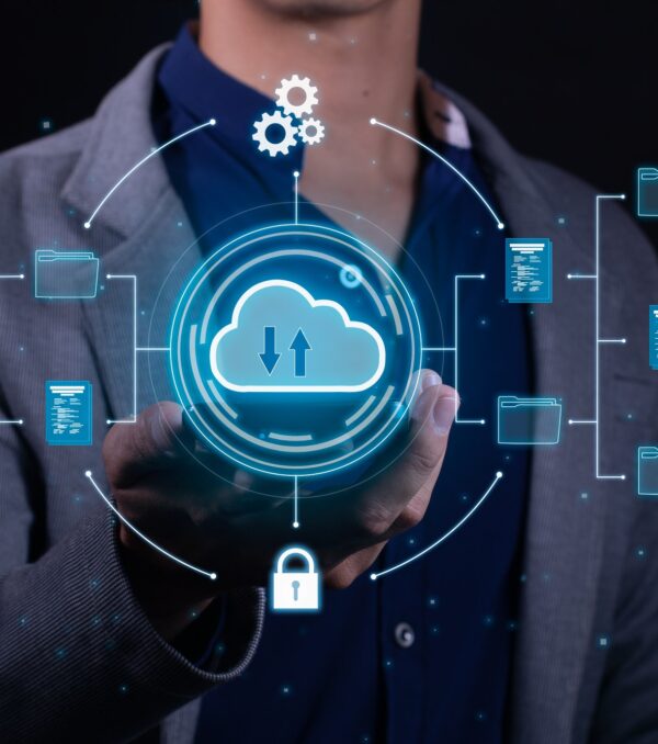 A man employs cloud-based computing on his smartphone to facilitate data transmission and backup. A man employs cloud-based computing on his smartphone to facilitate data transmission and backup.