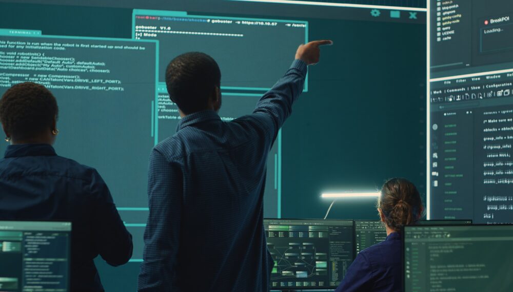 Cyber security team conducting cyber surveillance in governmental control room