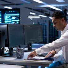Engineer maintaining accurate documentation of data center infrastructure, Engineer maintaining accurate documentation of data center infrastructure,