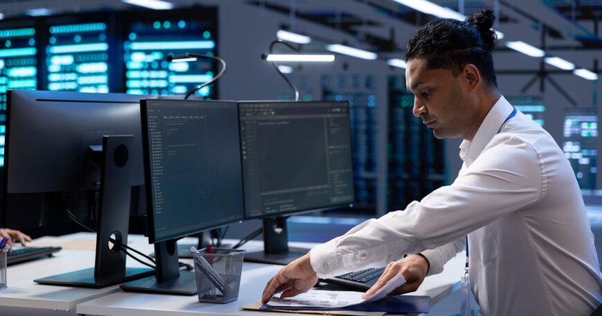 Engineer maintaining accurate documentation of data center infrastructure,