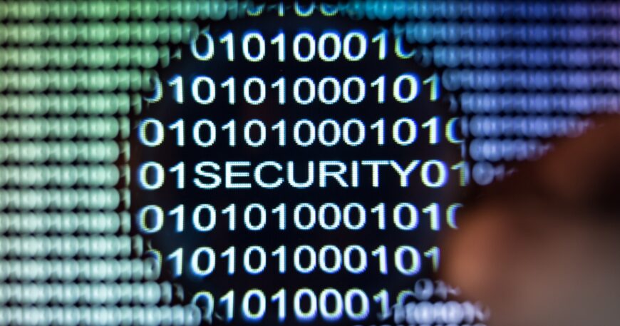 Word security written in binary code with magnifying glass